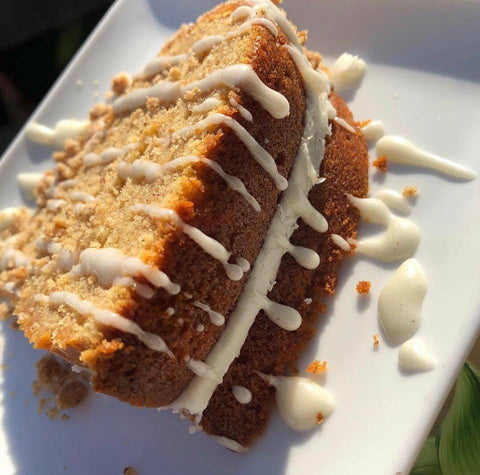 Sweet Potato Pound Cake from Washington, DC based bakery Tissy Sweets Bakery & Cafe. A sweet potato flavored pound cake covered with a cream cheese glaze and luscious pecan crumble.